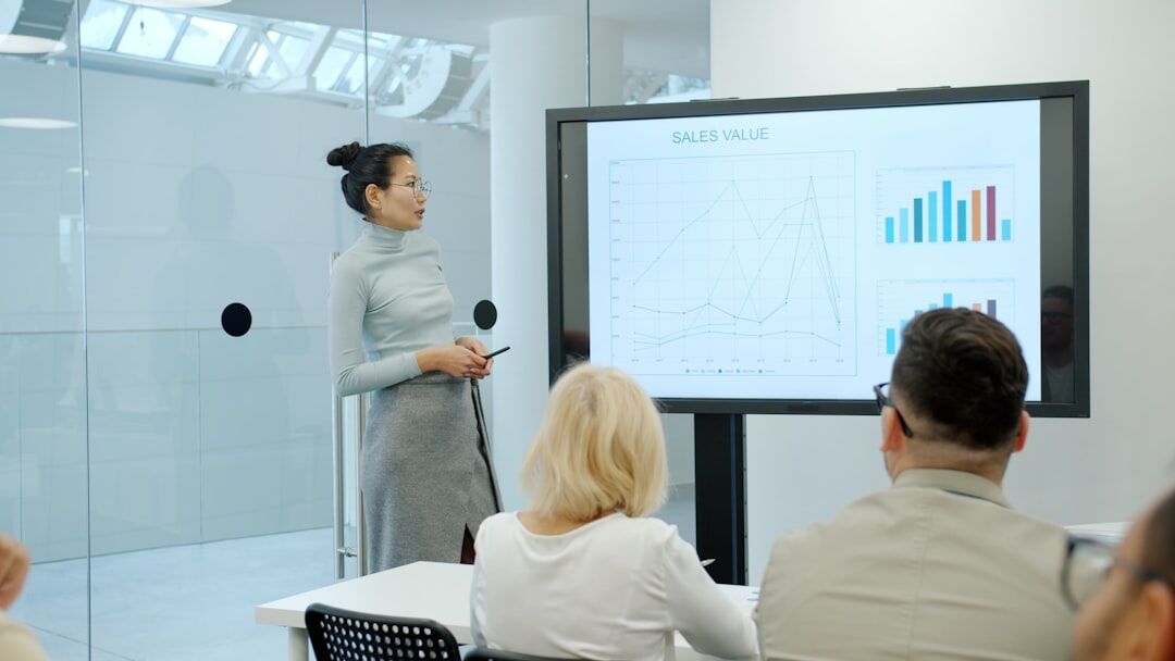 woman presenting to audience